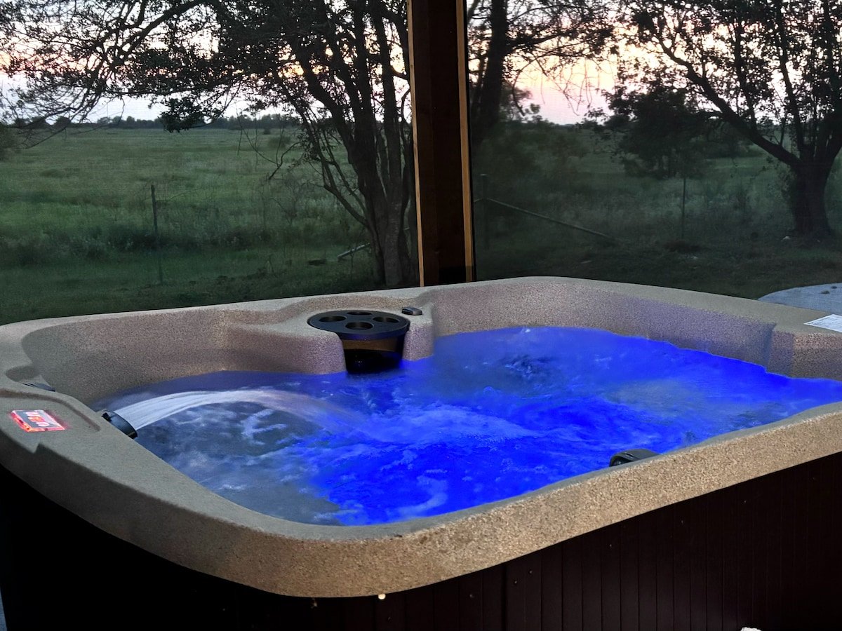 6-person hot tub with waterfall and color lighting